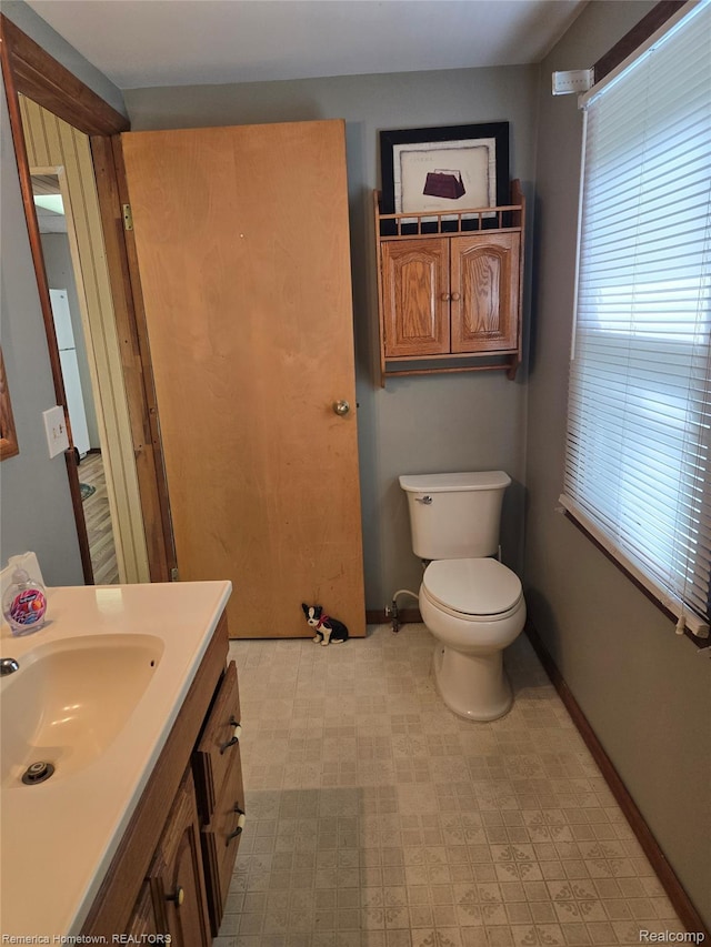 8991 Lakeview Dr, White Lake, MI 48386 - bathroom with vanity and tile patterned floors