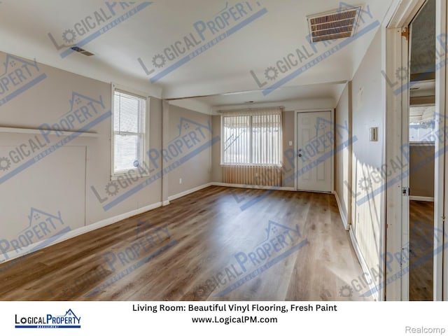 22100 Hawthorne St, Rochester, MI 48336 - entrance foyer featuring baseboards and wood finished floors