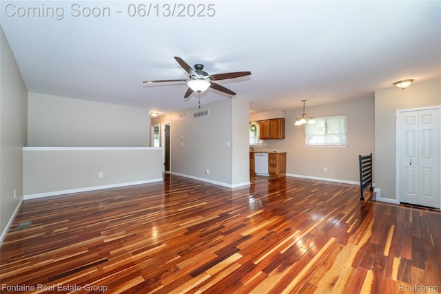 49904 Helfer Blvd, Wixom, MI 48393 - unfurnished living room with dark wood-style flooring and ceiling fan