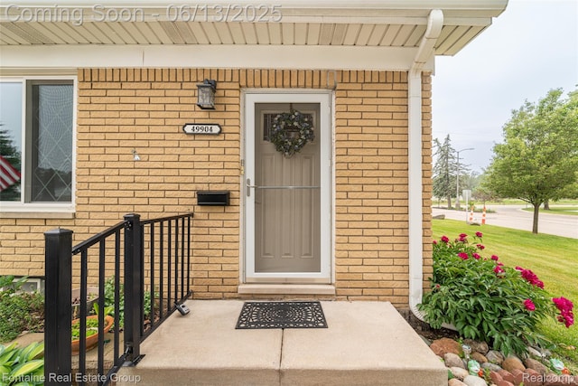 49904 Helfer Blvd, Wixom, MI 48393 - entrance to property featuring brick siding