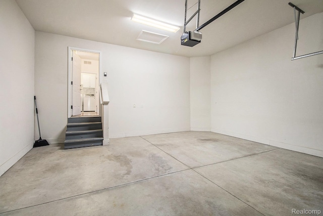 49761 Courtyard Ln, Canton, MI 48188 - garage with a garage door opener and baseboards