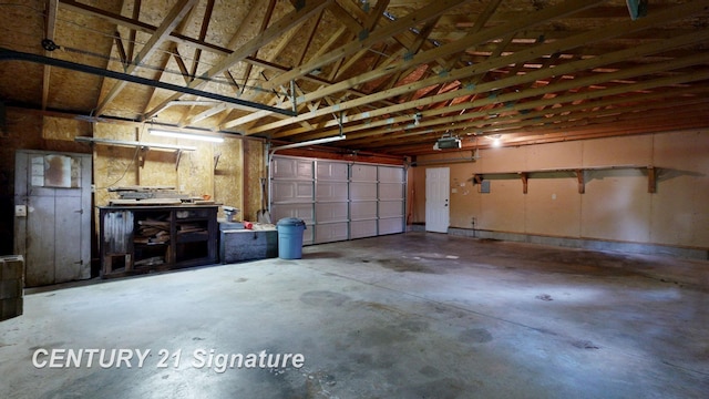 107 E Johns St, Durand, MI 48429 - garage featuring a garage door opener