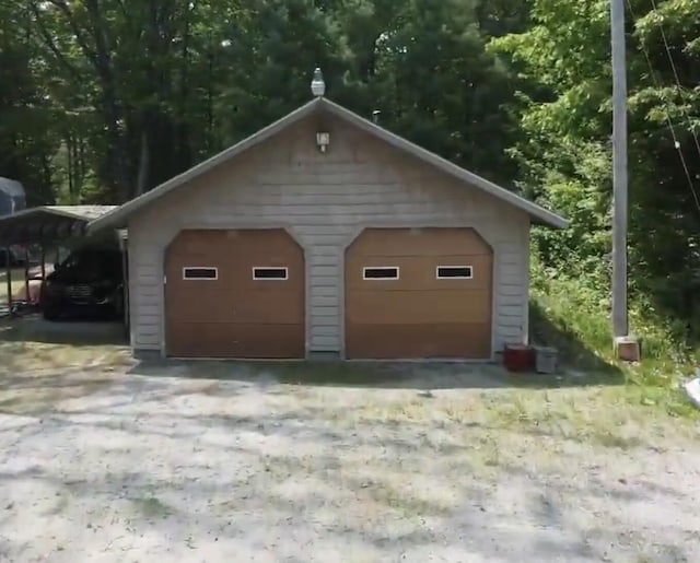 7484 Cedar Lake Rd, Oscoda, MI 48750 - view of detached garage