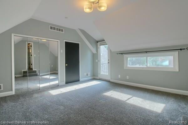 25811 Briarbank Ave, Southfield, MI 48033 - additional living space with vaulted ceiling, carpet floors, and baseboards