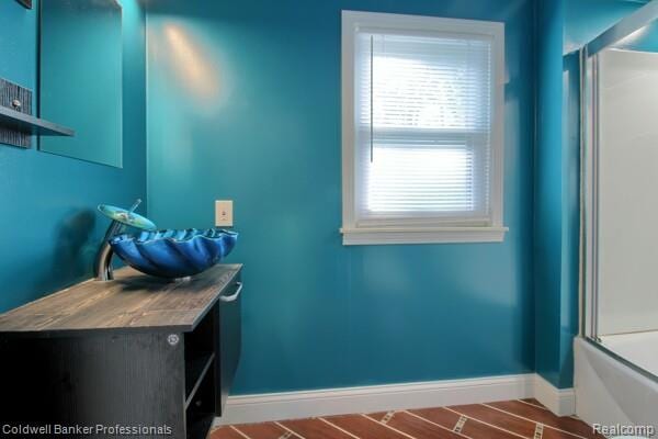 25811 Briarbank Ave, Southfield, MI 48033 - full bath with baseboards, a shower, and vanity