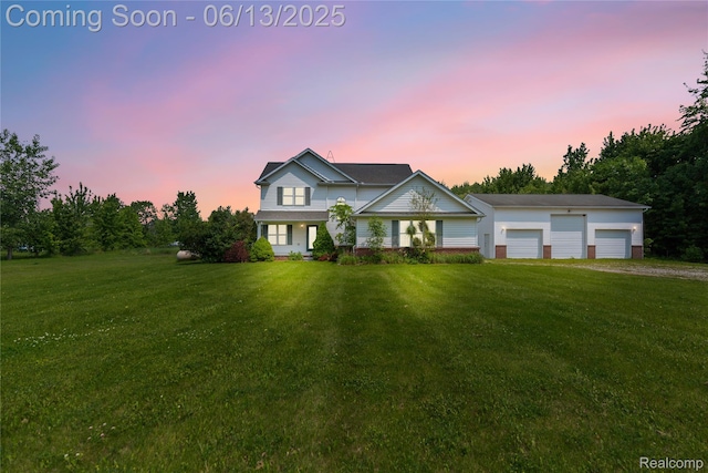 12172 Rynn Rd, Emmett, MI 48022 - traditional home featuring a front yard and a garage