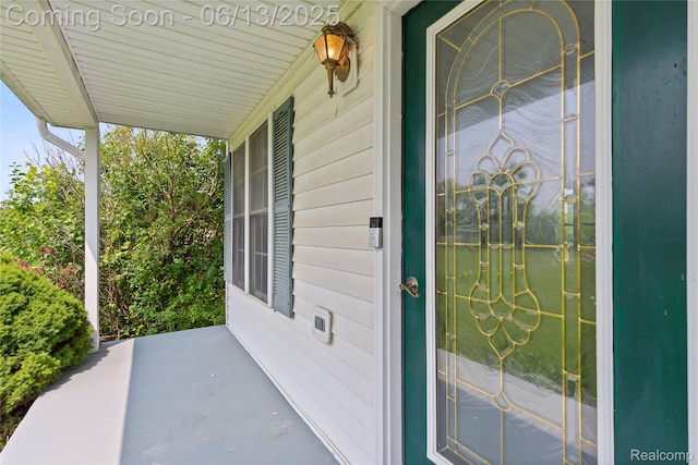 12172 Rynn Rd, Emmett, MI 48022 - entrance to property featuring covered porch