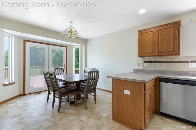 12172 Rynn Rd, Emmett, MI 48022 - dining area with a chandelier and baseboards