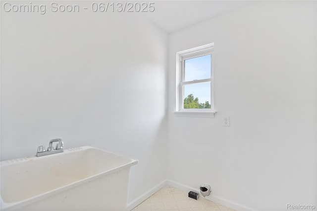12172 Rynn Rd, Emmett, MI 48022 - washroom with baseboards