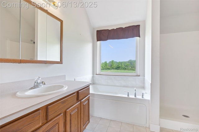 12172 Rynn Rd, Emmett, MI 48022 - full bathroom featuring vanity, a garden tub, tile patterned flooring, and a shower