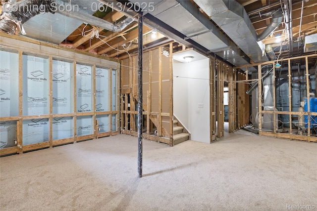 12172 Rynn Rd, Emmett, MI 48022 - unfinished below grade area featuring stairway, carpet floors, and heating unit