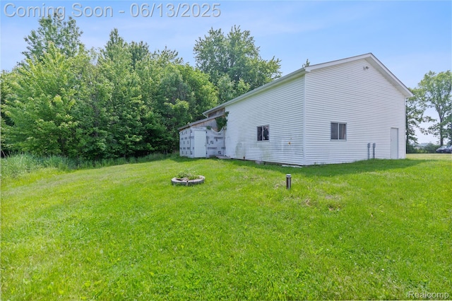12172 Rynn Rd, Emmett, MI 48022 - view of side of property with a lawn
