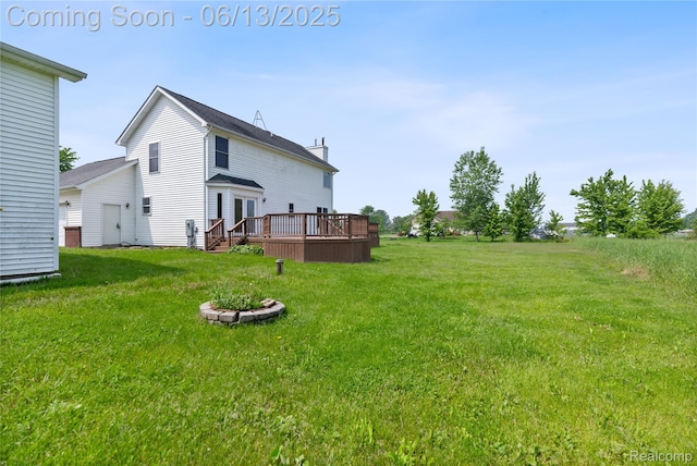 12172 Rynn Rd, Emmett, MI 48022 - view of grassy yard with a wooden deck
