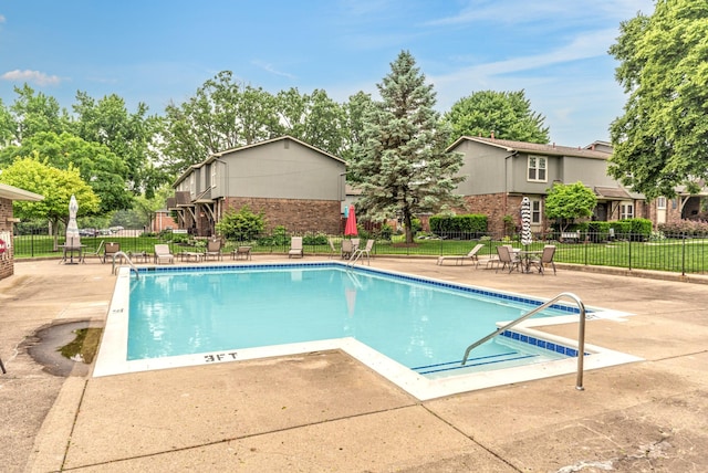 386 Hartman Ln, Saline, MI 48176 - community pool featuring a patio