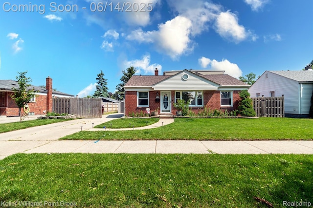 7359 Mckinley, Center Line, MI 48015 - view of front of property with brick siding and concrete driveway