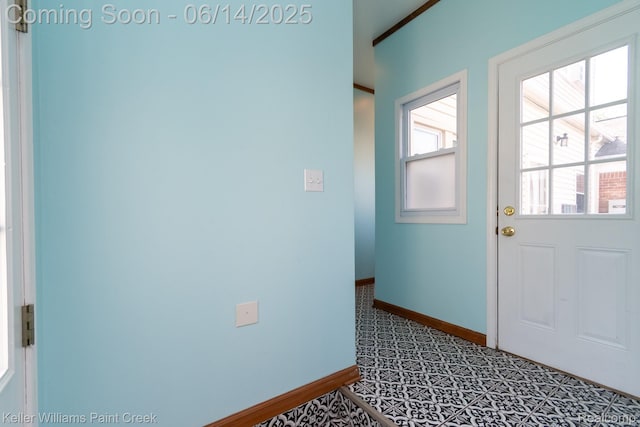 7359 Mckinley, Center Line, MI 48015 - doorway to outside featuring baseboards