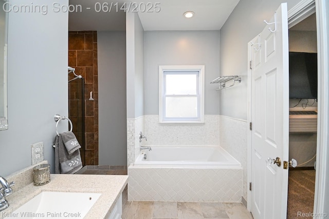 7359 Mckinley, Center Line, MI 48015 - bathroom featuring a garden tub and vanity