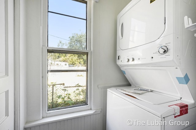 630 Prospect Ave NE, Grand Rapids, MI 49503 - laundry room featuring stacked washer / dryer