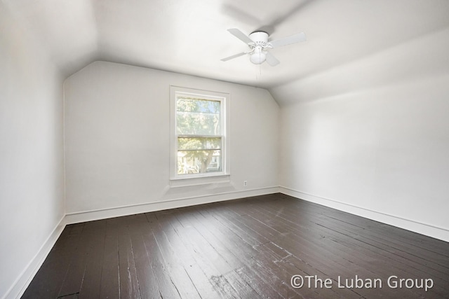 630 Prospect Ave NE, Grand Rapids, MI 49503 - additional living space featuring lofted ceiling, dark wood-style floors, a ceiling fan, and baseboards