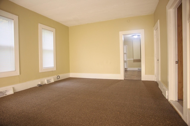 121 Houseman Ave NE, Grand Rapids, MI 49503 - spare room featuring carpet floors