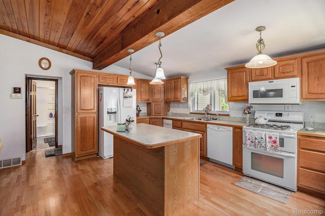 3277 Baldwin Rd, Metamora, MI 48455 - kitchen featuring white appliances, light countertops, light wood-style floors, a kitchen island, and pendant lighting