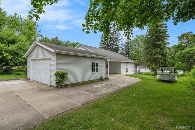 3277 Baldwin Rd, Metamora, MI 48455 - view of property exterior with a lawn, driveway, and a shingled roof