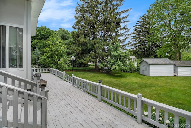 3277 Baldwin Rd, Metamora, MI 48455 - deck with a yard, a storage unit, and view of wooded area