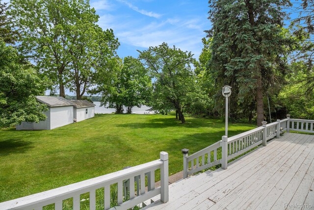3277 Baldwin Rd, Metamora, MI 48455 - deck with a yard and an outdoor structure