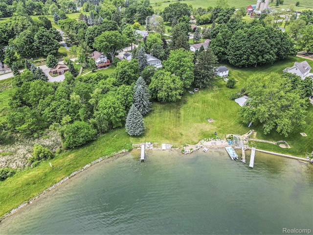 3277 Baldwin Rd, Metamora, MI 48455 - aerial overview of property's location featuring a large body of water and a tree filled landscape