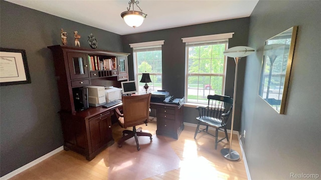 763 Chemung Forest Dr, Howell, MI 48843 - home office featuring baseboards and light wood finished floors