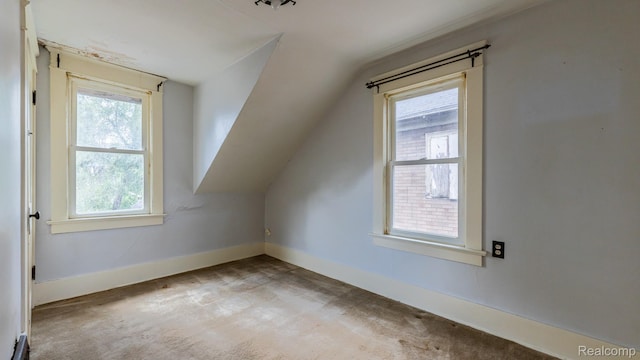 218 Clifford St, Lansing, MI 48912 - bonus room featuring vaulted ceiling and carpet flooring
