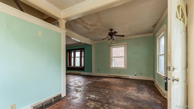 218 Clifford St, Lansing, MI 48912 - spare room with ornamental molding, a baseboard heating unit, ceiling fan, a baseboard radiator, and wood-type flooring