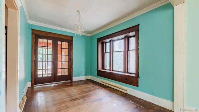 218 Clifford St, Lansing, MI 48912 - unfurnished room with french doors, a baseboard radiator, crown molding, wood finished floors, and a chandelier