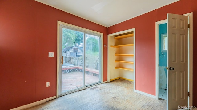218 Clifford St, Lansing, MI 48912 - empty room with light wood-type flooring