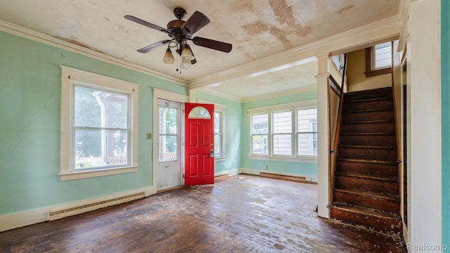218 Clifford St, Lansing, MI 48912 - foyer featuring a baseboard radiator, stairway, ornamental molding, ceiling fan, and hardwood / wood-style flooring