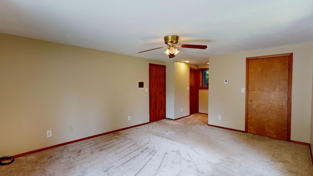 160 Wire Line Rd, Caro, MI 48723 - empty room featuring a ceiling fan, carpet floors, and baseboards