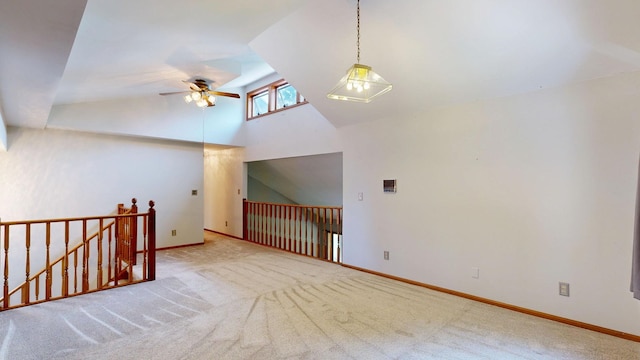 160 Wire Line Rd, Caro, MI 48723 - unfurnished room with ceiling fan, carpet, baseboards, and high vaulted ceiling