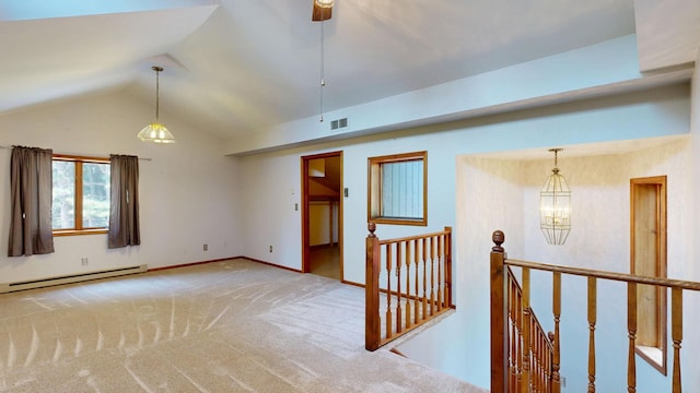 160 Wire Line Rd, Caro, MI 48723 - carpeted empty room featuring baseboard heating, lofted ceiling, a chandelier, and baseboards