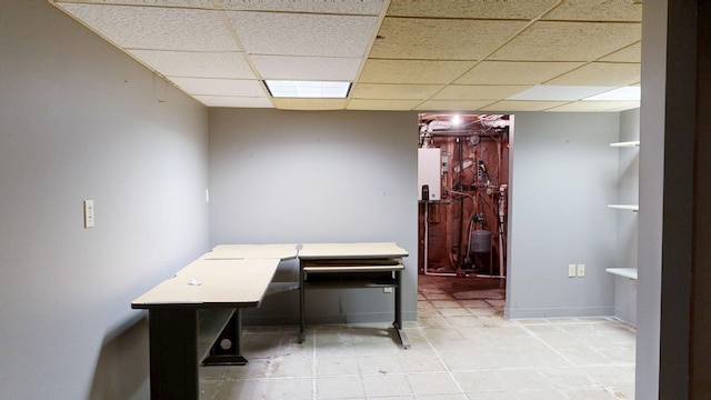 160 Wire Line Rd, Caro, MI 48723 - office area with a paneled ceiling, tankless water heater, and light tile patterned flooring