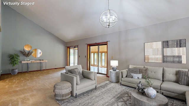 160 Wire Line Rd, Caro, MI 48723 - carpeted living area featuring high vaulted ceiling, a chandelier, and baseboards