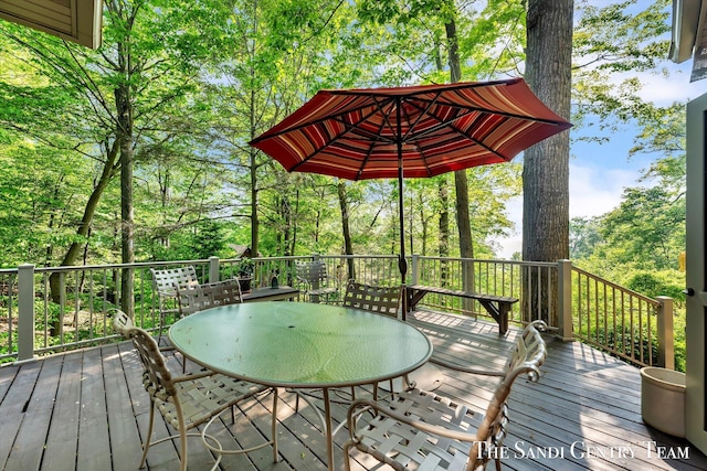 8985 Lakeshore Dr, West Olive, MI 49460 - deck featuring outdoor dining area