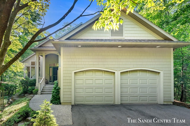 8985 Lakeshore Dr, West Olive, MI 49460 - view of front of property featuring a shingled roof