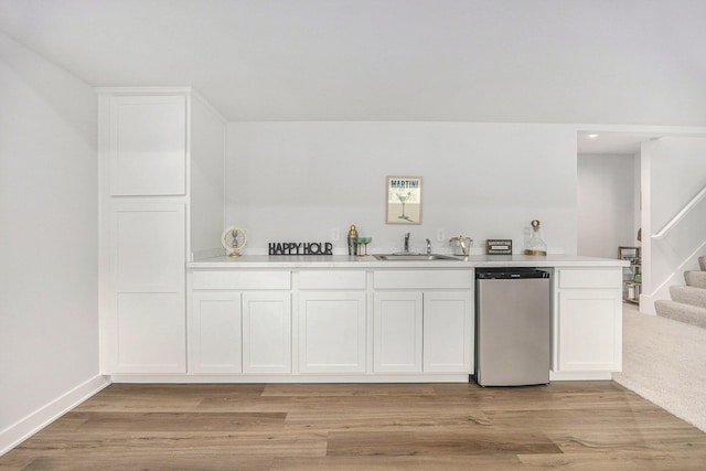 LotA Chandler Drive Ne, Belmont, MI 49306 - indoor wet bar featuring dishwasher, stairs, light wood finished floors, and recessed lighting