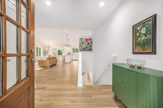 LotA Chandler Drive Ne, Belmont, MI 49306 - corridor with an upstairs landing, light wood-style floors, recessed lighting, and a chandelier