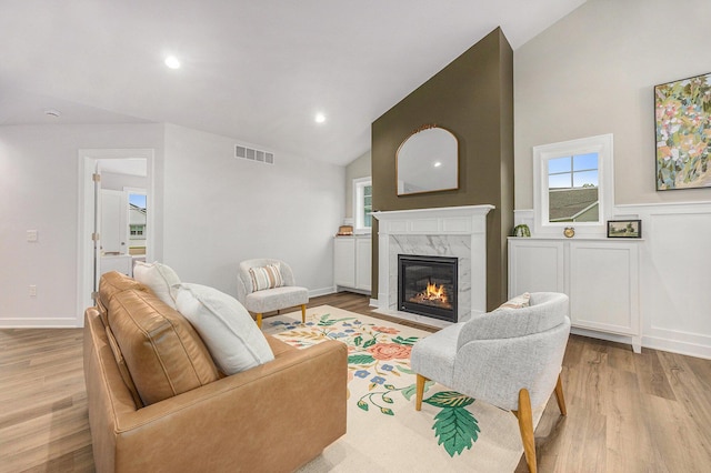 LotA Chandler Drive Ne, Belmont, MI 49306 - living area featuring a fireplace, light wood finished floors, high vaulted ceiling, recessed lighting, and baseboards