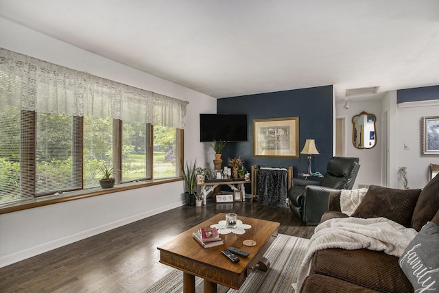 219 W Hamilton Ln, Battle Creek, MI 49015 - living area with wood finished floors and baseboards