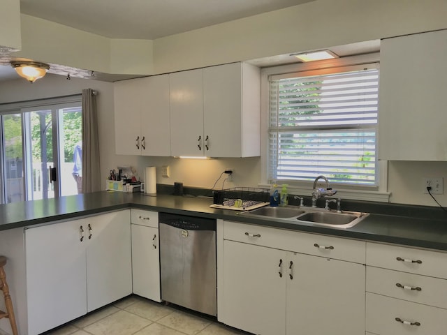 66223 Grey Lake Rd, Sturgis, MI 49091 - kitchen featuring dishwasher, a sink, dark countertops, and healthy amount of natural light