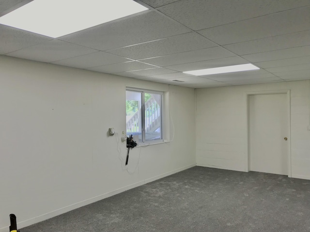 66223 Grey Lake Rd, Sturgis, MI 49091 - basement featuring dark carpet and a paneled ceiling