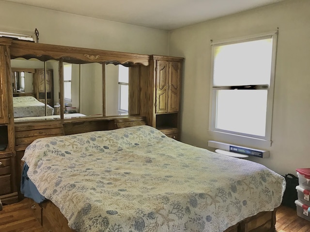 66223 Grey Lake Rd, Sturgis, MI 49091 - bedroom featuring multiple windows and wood finished floors