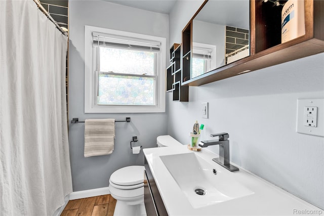 4006 Highfield Rd, Royal Oak, MI 48073 - full bathroom with toilet, vanity, wood finished floors, baseboards, and curtained shower